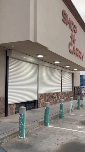 Along the storefront. Rolling shutter installation