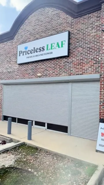 A brick-front close-up. Rolling shutter installation
